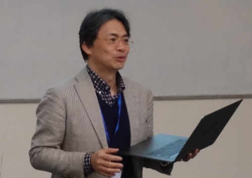 Biointerfaces Unit's Prof. Yasuharu Koike explaining outcomes of Neuroscience and Robotics group