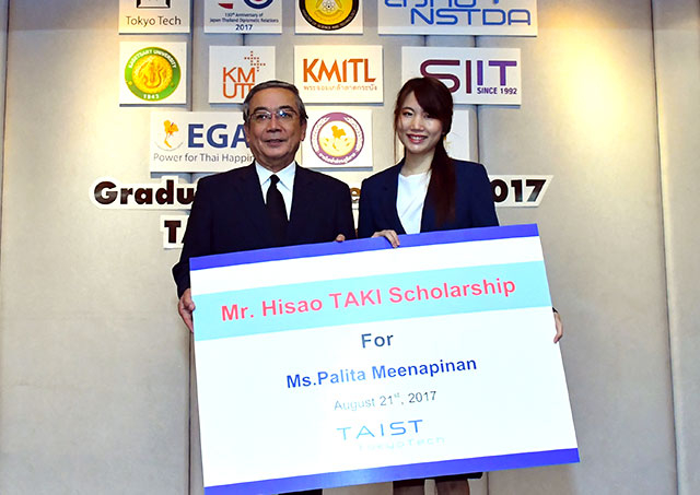 President Mishima with scholarship recipient Ms. Meenapinan