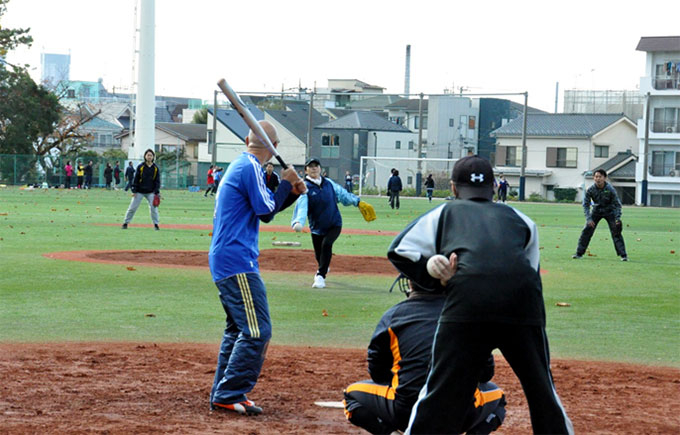 Finance Dept. slugger up against Facilities Dept. pitcher