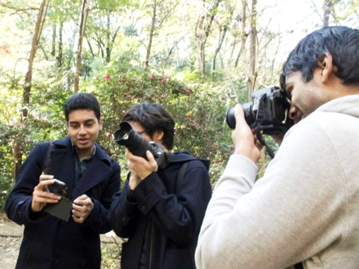 Participants showing their photos each other