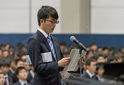 Representative for bachelor's students delivering a statement