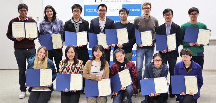 Winter Program participants display their certificates of completion