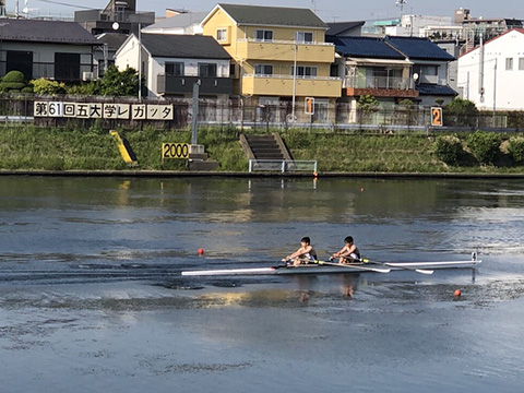 Double scull Ogiso (left) and Shirai guiding their white arrow to second place