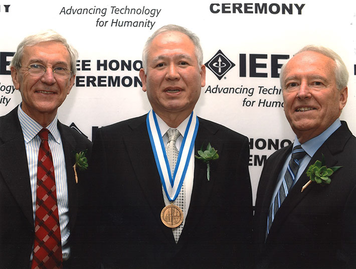 Akagi with IEEE President James A. Jefferies (right) and IEEE President-elect Jose M.F. Moura