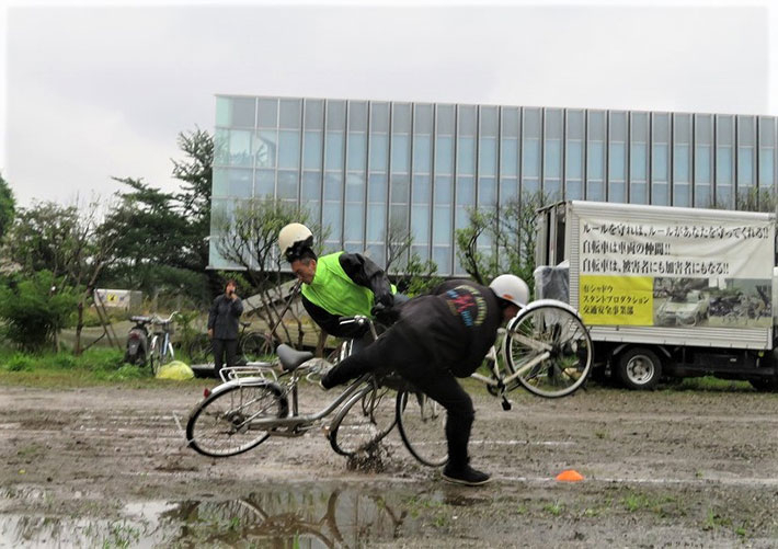 Bicycle crash enacted by stuntmen