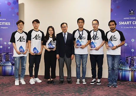 Yamada (third from right) and team with awards for Best Presentation, Student Workshop