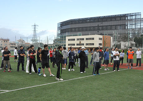 Teams line up for opening words from President Masu (right) 