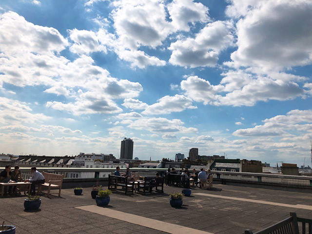 Lab members on break on the roof