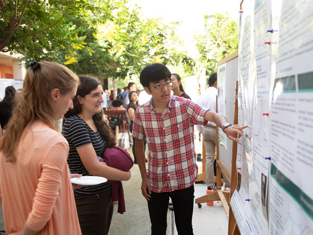 Uchiyama (right) at poster session