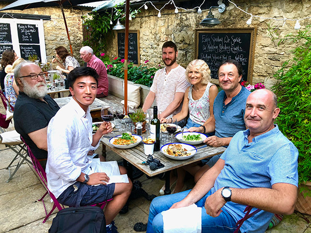 Fujisawa (left) with project members at dinner