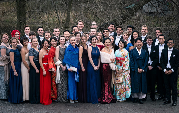 Tsuchiyama (in light blue kimono) in Sweden with other leading young scientists. Photo courtesy of Japan Prize Foundation