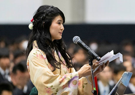 Iori Kajitani delivering valedictory at bachelor's degree graduation ceremony
