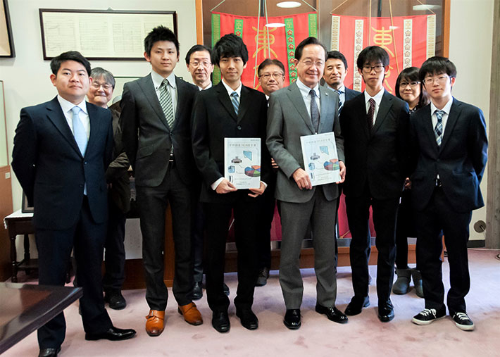 Five student staff reps with Masu (front, third from right) and faculty working group