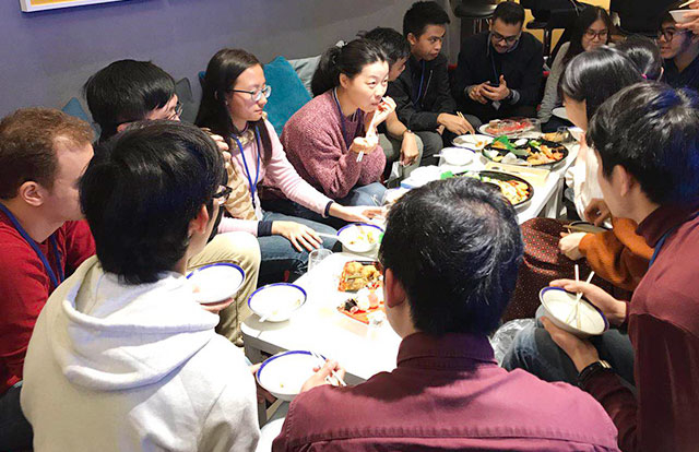 Participants enjoying a meal together