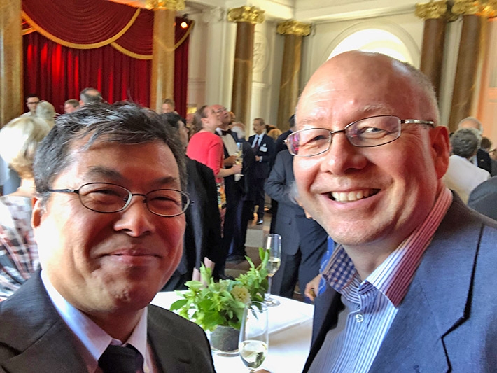 Photo at the Reception of the ceremony, with Prof. Dr. Otto Dopfer (TU Berlin and Specially appointed professor of WRHI Tokyo Tech) who recommended MF to the foundation.