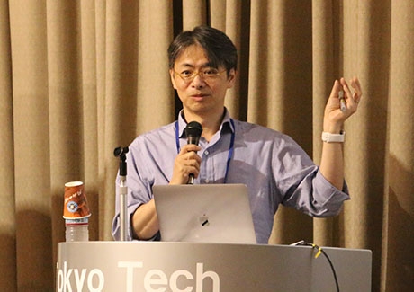 Koike discussing his work on brain-machine interfaces