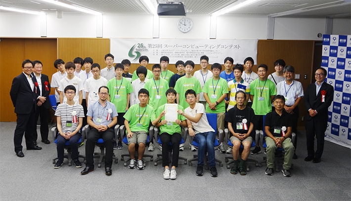 Participants at Osaka, with contest winners in center of front row