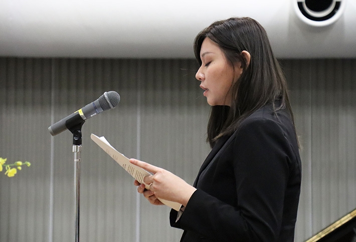 Student representative Leo giving her speech