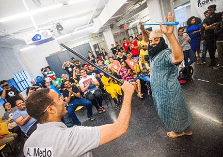 Students and instructor performing traditional Egyptian dances 