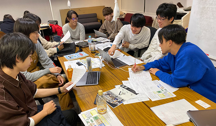 Students discussing ideas at Attic Lab