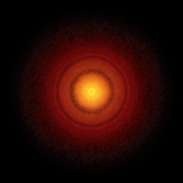 Den unge stjerne TW Hydrae's begyndende planetsystem, fotograferet af ALMA