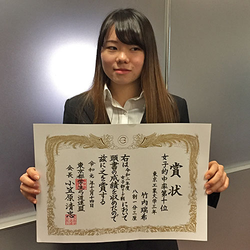 Takeuchi with her overall accuracy certificate