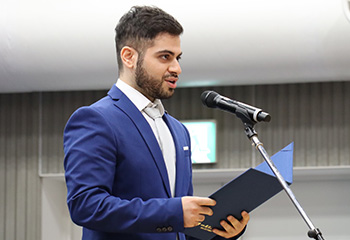 Student representative Nazarahari giving speech