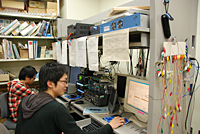 Students operating an LSS ground control station at Tokyo Tech for monitoring nanosatellites.