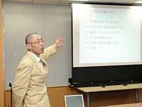 Sakae Takagi, of Tokyo Tech's Office of Industry Liaison, addresses the venture capitalists assembled at the sixth Start-up Station, in June 2009.