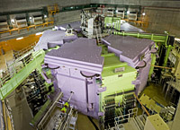 Superconducting Ring Cyclotron (SRC) at RIBF at RIKEN. Completed in 2006, this is the world's largest cyclotron. The SRC can accelerate heavy ions up to about 70% of the speed of light. In our experiments, an intense 48Ca beam at 345 MeV/nucleon was used to produce exotic nuclei 31Ne.