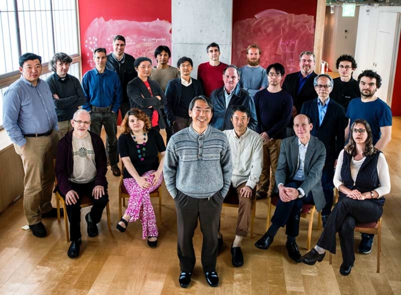 Director Kei Hirose (center) and other leading researchers at ELSI.