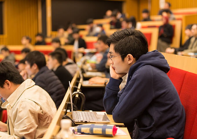 Students taking lectures