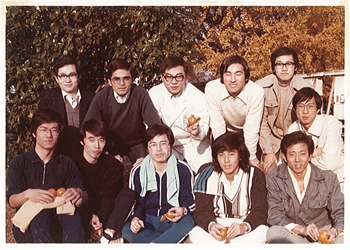 Professor Chong (back row, far right) with members of Suematsu Lab