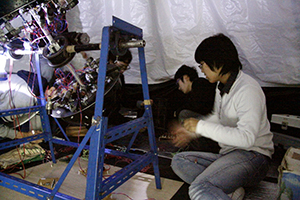 Astronomy Club members work on the electronic circuitry to control the planetarium that will feature in Tokyo Institute of Technology's annual student festival