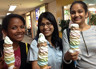 Roy (center) challenging seven-scoop ice cream with friends