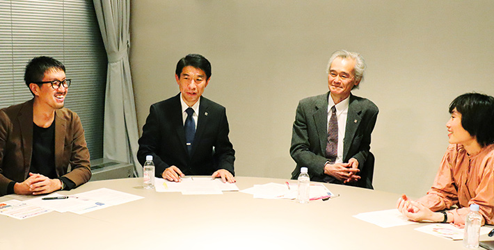 Director Isao Satoh and three other DLab members