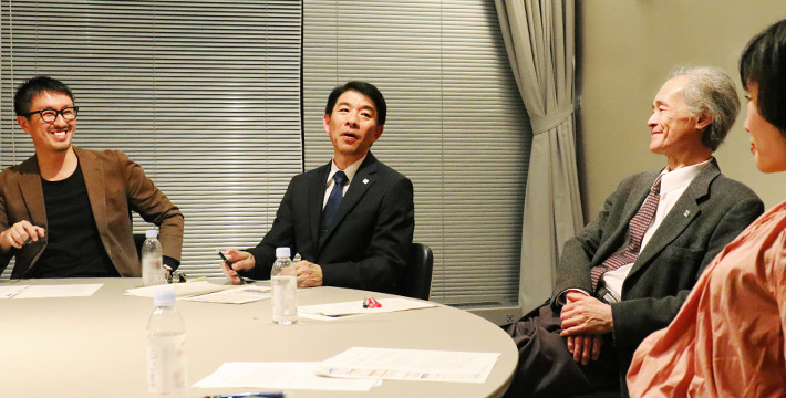 Director Isao Satoh and three other DLab members