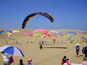 Paragliding event held at Tottori Sand Dunes, in western Japan.