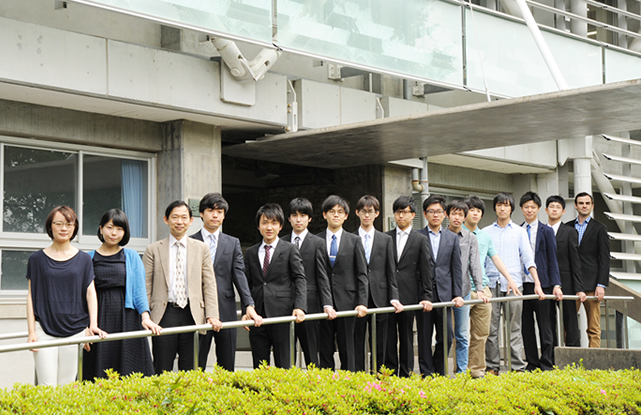 Takeuchi lab members at Midorigaoka Bldg 1, with BRB retrofit and thin plate concrete entrance canopy