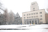 Children make snowmen in front of Main Building.