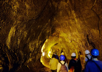 Inside the lava tube out of which lava flows during an eruption