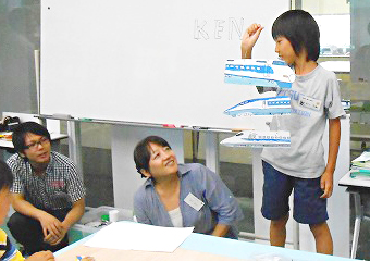 Participating child giving a presentation