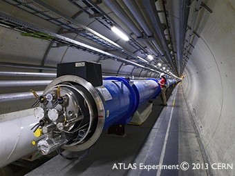 The vacuum pipes of the accelerator located 100 m underground forms a ring with a circumference of 27 km. The photograph shows how the pipe is curved. Protons are accelerated to 99.999999% the speed of light. To bend the proton beams, the vacuum pipe is covered with superconducting magnets of 8.3 teslas. The blue tube is the outer cover.