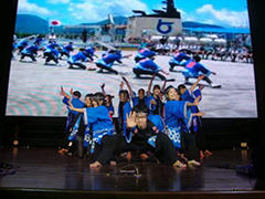 Dancing Soran Bushi , a traditional Japanese folk dance, at a party