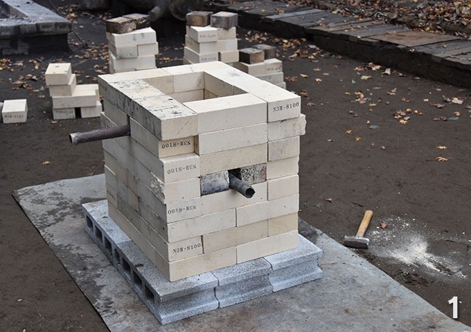 Students built the simplified tatara furnace using refractory bricks.