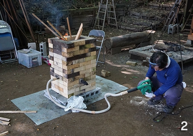 They used an electric blower to preheat the furnace and accelerate charcoal combustion.