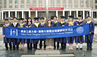Group photo after graduation ceremony in front of THU Main Building