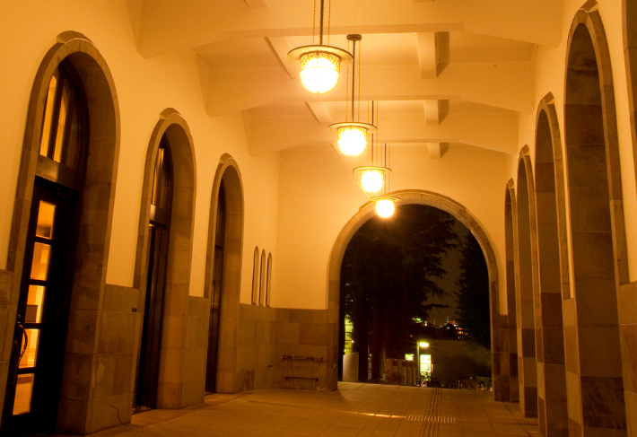 The entrance of the Main Building at night 