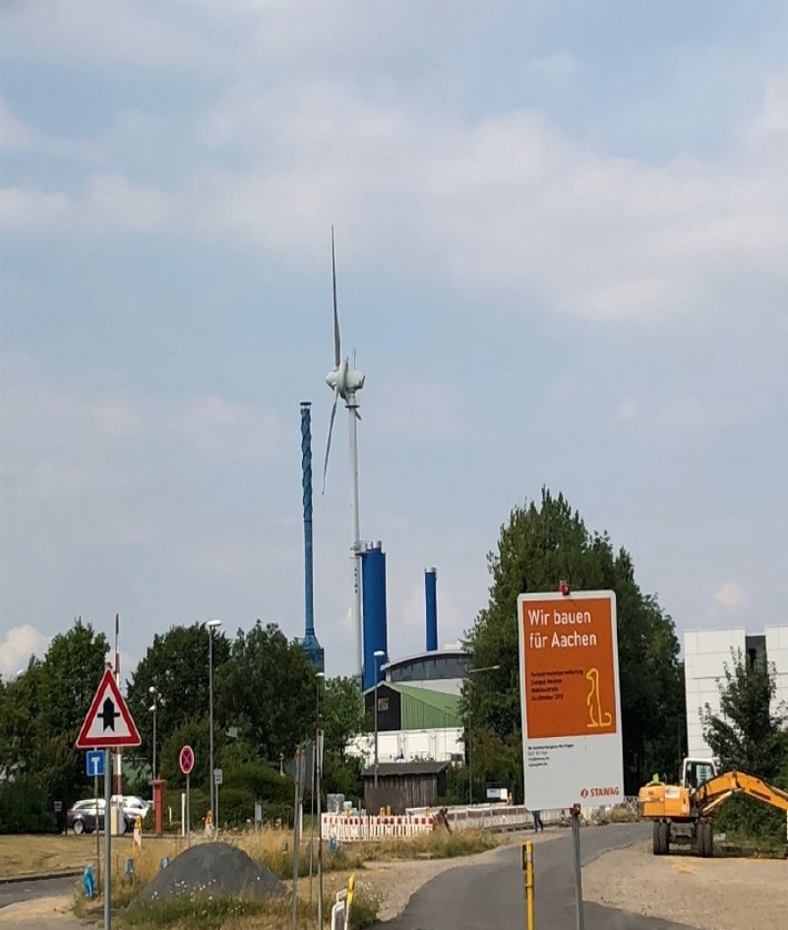 and the wind turbine for research (right)