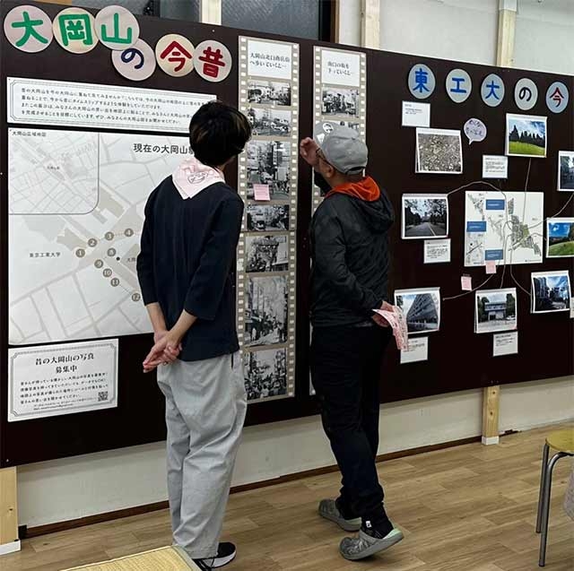 来場者から昔の大岡山の話を聞く